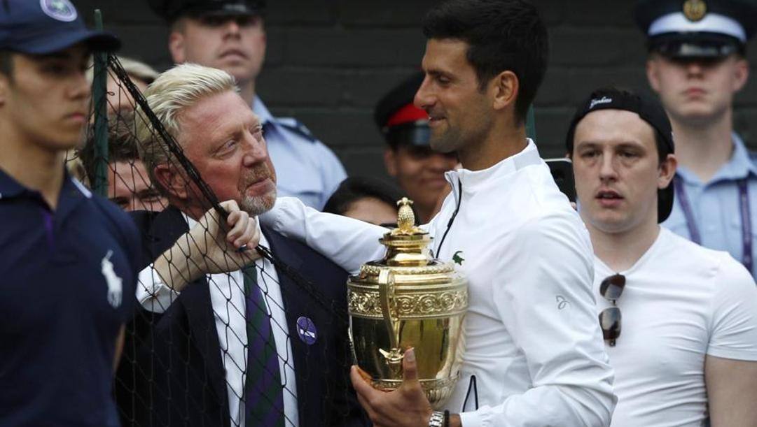 Boris Becker, 52 anni con Novak Djokovic, 32. Epa 